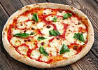 "На одну пиццу с натуральной моцареллой приходится три пиццы с аналогом". Что говорят участники отрасли о фальсификатах сыра в пицце